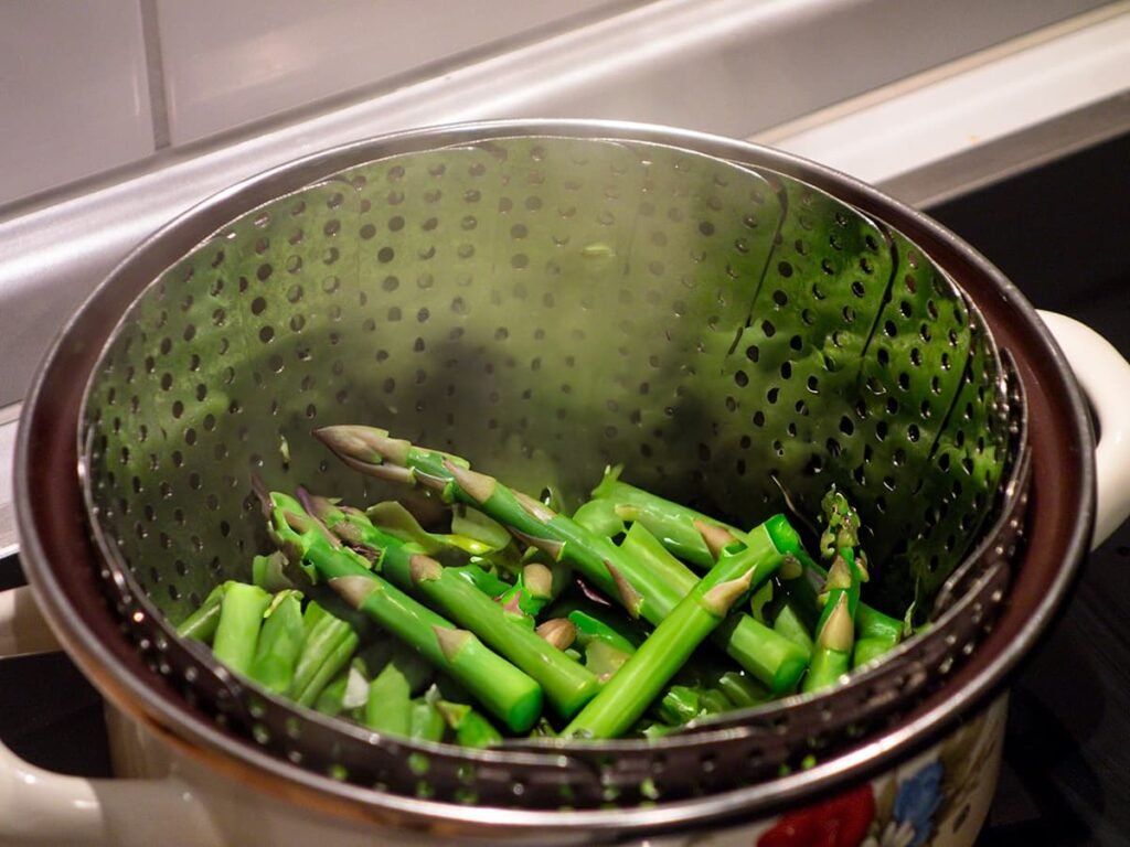 Gestoomde asperges